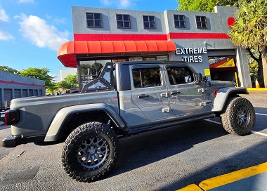 Truck in front of Extreme Tires storefront in Sunrise, FL